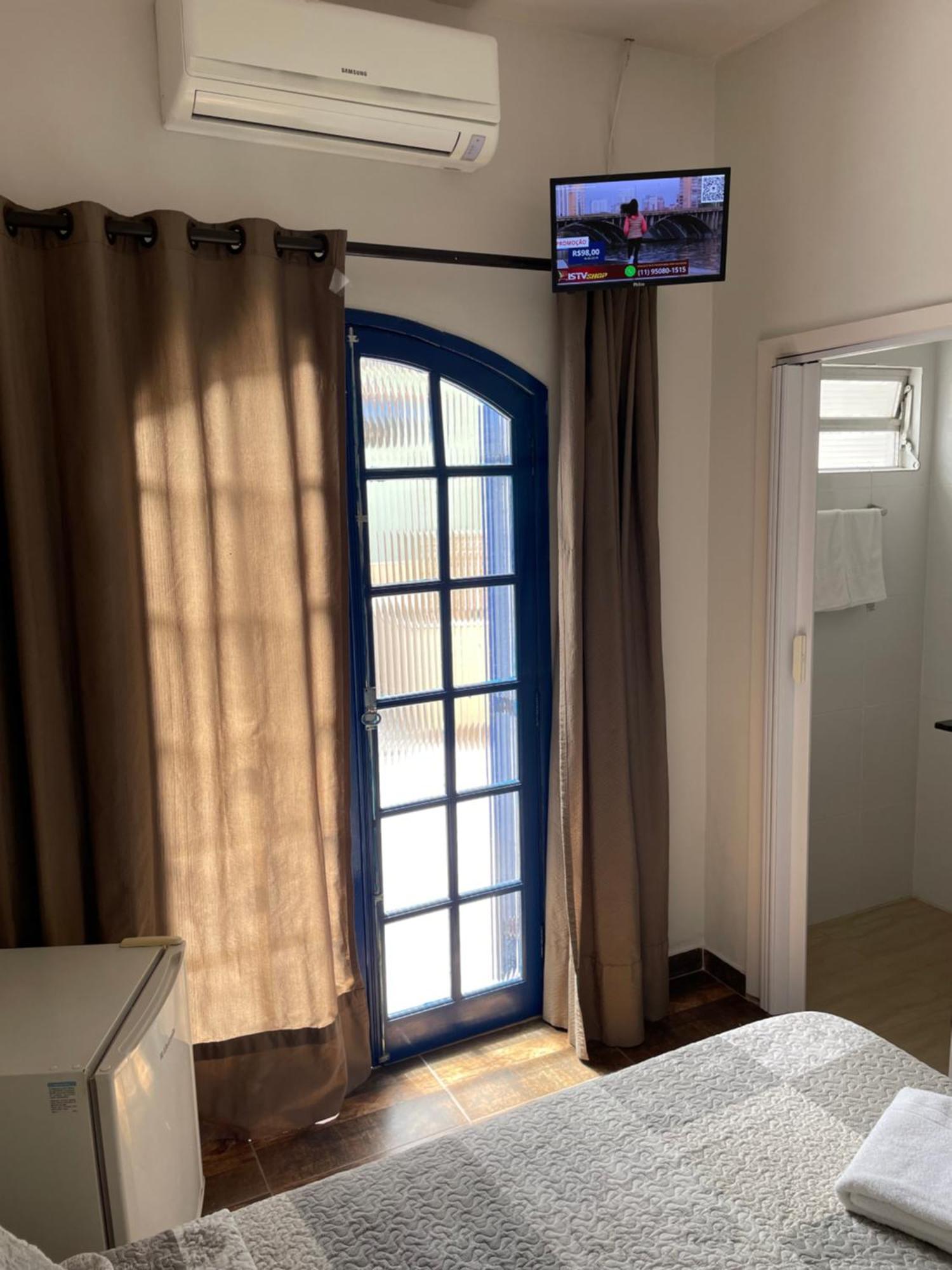 Villa Di Verona Charm Hotel Guarujá Rum bild