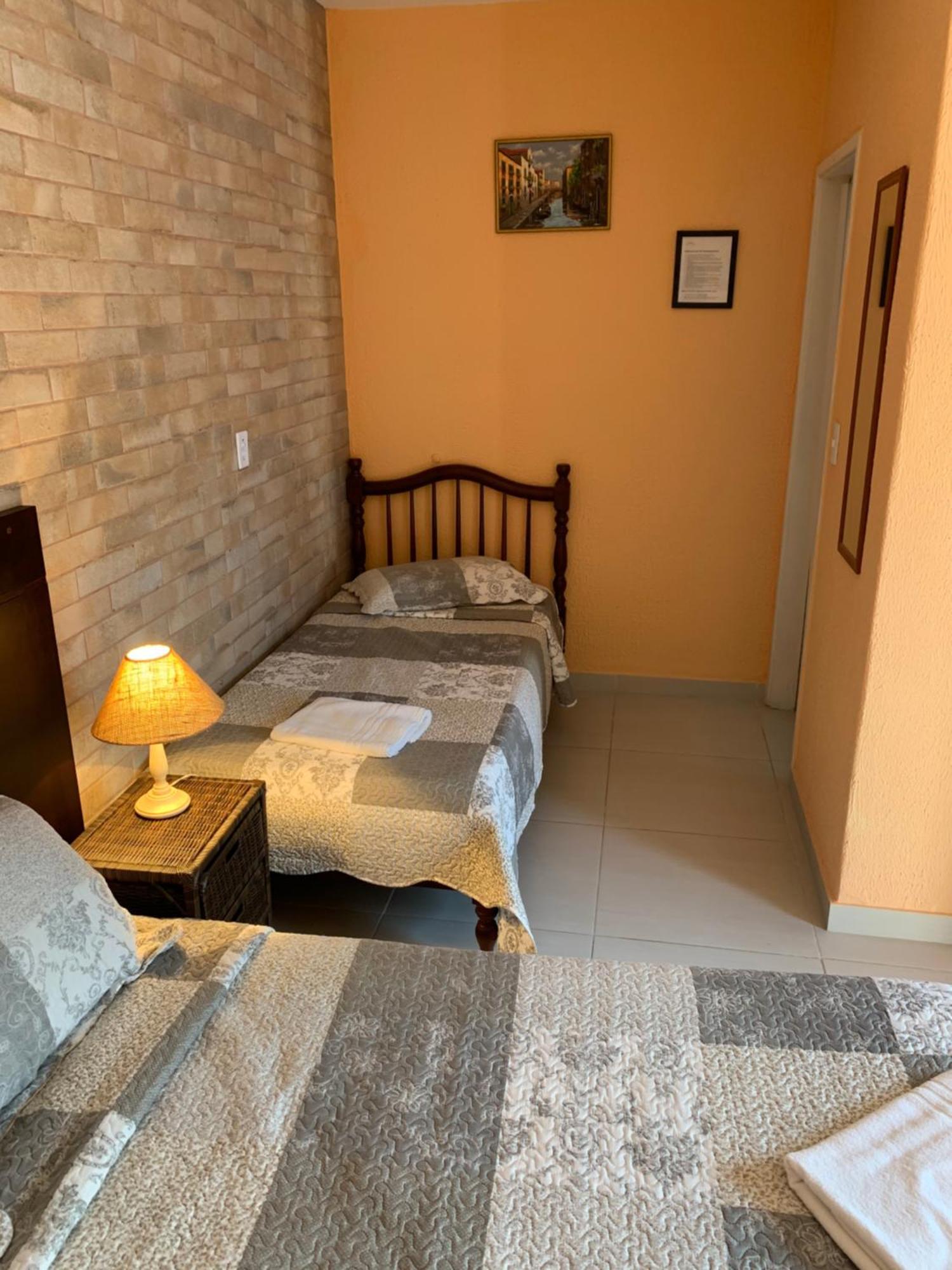 Villa Di Verona Charm Hotel Guarujá Rum bild